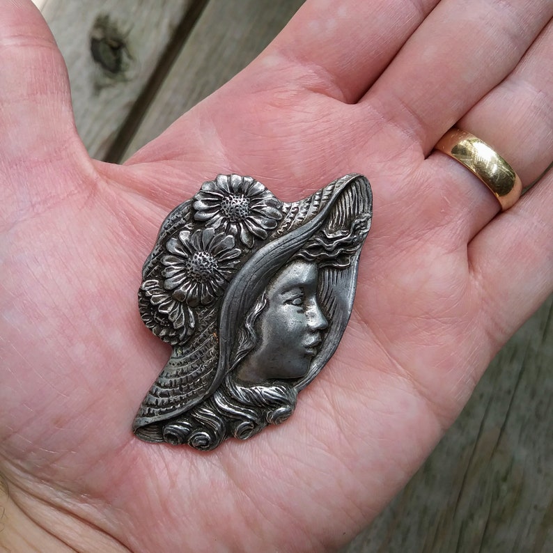 Signed Vintage Brooch by Seagull Pewter of Canada Very good condition pewter brooch with rollover safety pin Girl with Flower Straw Hat