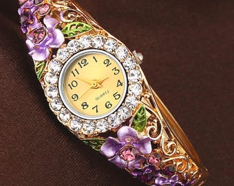 Enamel Flower Gold Tone Cuff Watch, Rhinestone Accents.  Check listing for additional colors, styles and designs.