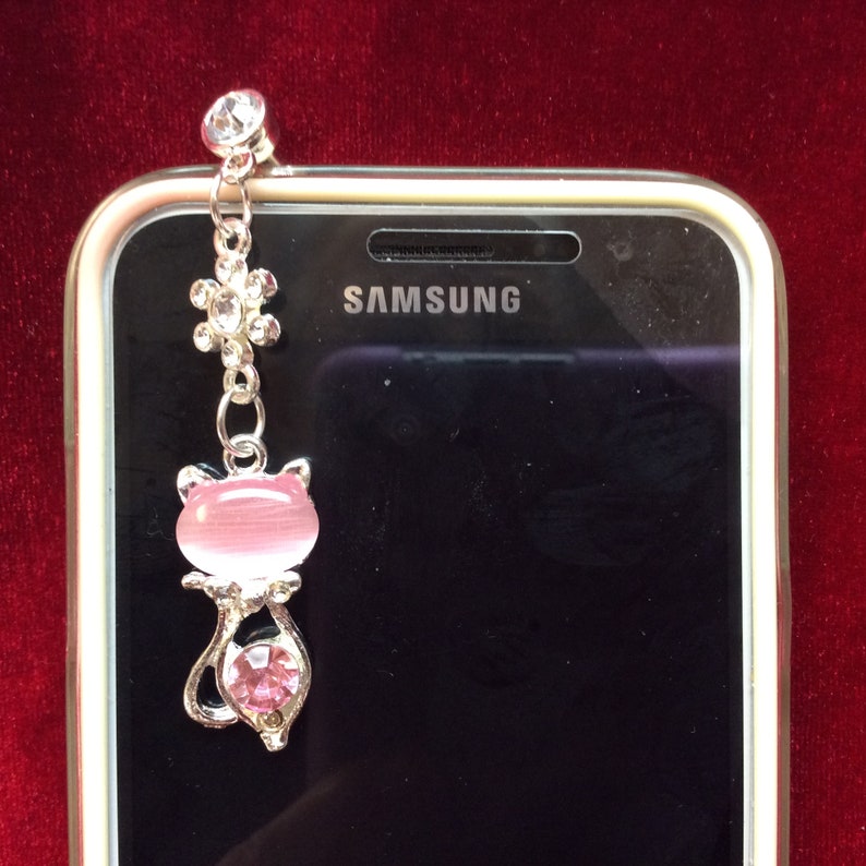 DP 27-30 Blue Adorable Cell Phone Headphone Jack Dust Plug Jeweled Hanging Cat Design in Black White /& Pink with Rhinestone Accents