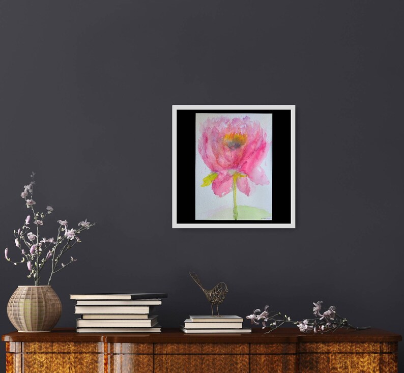 May include: A watercolor painting of a pink flower with a yellow center. The flower is painted in a loose, impressionistic style.