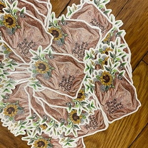 Eye-catching custom stickers in various designs. Personalize your items effortlessly with vibrant and unique decals. Alt text: Diverse custom sticker options for personalized expression.