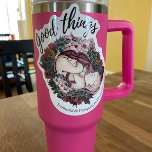 A die-cut vinyl sticker applied to a water bottle, showcasing its durability and adhesive quality.