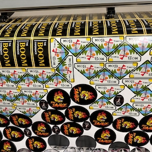 Elevate your style with custom stickers from Stickersfox. Choose from a variety of designs and sizes to personalize your belongings. Alt text: Vibrant custom stickers for personalization and self-expression.