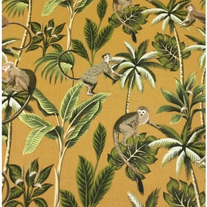 May include: A mustard yellow fabric with a repeating pattern of monkeys and palm trees. The monkeys are brown and white and the palm trees are green with white accents.