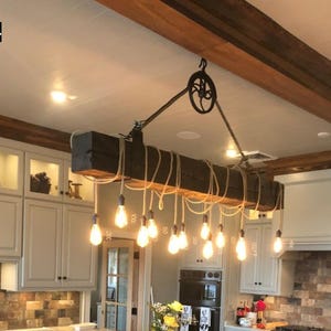 Beam Chandelier made with reclaimed barn wood