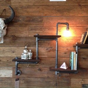 Reclaimed wood shelf with pipes