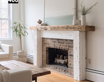 Può includere: Un camino rustico con un caminetto in legno stagionato e supporti verniciati di bianco. Il focolare in mattoni è vuoto e il caminetto espone vasi decorativi e libri. Una grande opera d'arte incorniciata è appesa sopra il caminetto e una pianta in vaso è vicina.