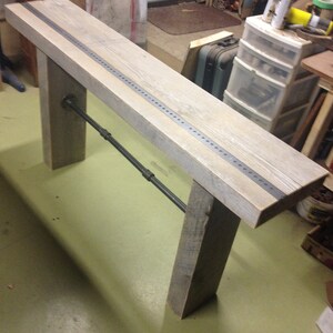Rustic console with pipes and metal insert