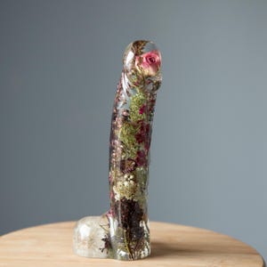 May include: A trio of ceramic mugs with a speckled, matte finish in cream, light grey, and dark grey. Each mug features a minimalist design and a rounded handle.