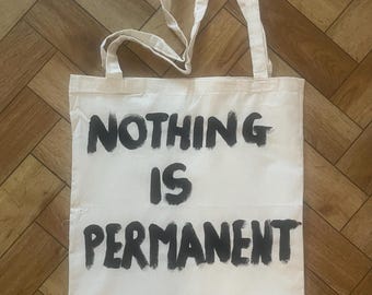 Nothing is permanent tote bag