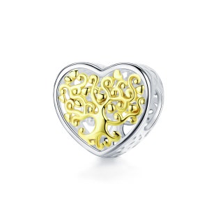 May include: A silver heart-shaped charm with a gold tree of life design. The tree has intricate branches and leaves, and the heart is openwork.
