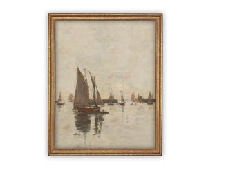May include: A framed oil painting depicting a harbour scene with multiple sailboats on calm water under a pale, overcast sky. The artwork features muted tones of beige, grey, and brown, enclosed within a textured, metallic gold-toned frame.