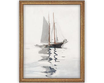May include: A framed watercolour painting depicting a sailboat on calm water. The artwork features a grey and brown sailboat with a reflection on the surface, set within a textured gold-toned frame. The overall composition is light and neutral.