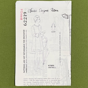 May include: Vintage Spadea Designer Pattern 62219, size 18, featuring a coat design by Norman Hartnell. The illustration shows a woman in a coat with a flared skirt and decorative trim. The pattern is from 1969.