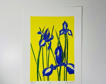 Blue Irises in a bright sunny yellow background lino print