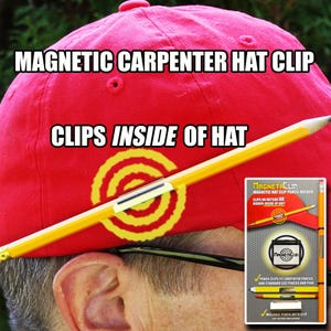 May include: A red baseball cap with a magnetic carpenter hat clip attached to the brim. The clip holds a yellow pencil. The text "MAGNETACLIP" and "MAGNETIC HAT CLIP PENCIL HOLDER" is printed on a white label. The text "CLIPS ON OUTSIDE OR HIDDEN INSIDE OF HAT" is also printed on the label.