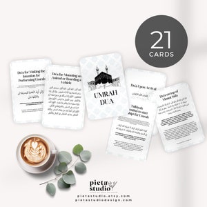 May include: A set of 21 cards with Islamic prayers for Umrah, featuring Arabic text and illustrations of the Kaaba. The cards are white with black text and illustrations.