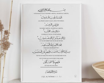 May include: Black and white printable art print with Arabic text and English translation of the first chapter of the Quran, Al-Fatiha. The text reads "In the name of Allah, the Entirely Merciful, the Especially Merciful...", and "Q.S. Al Fatihah 1:1-7".