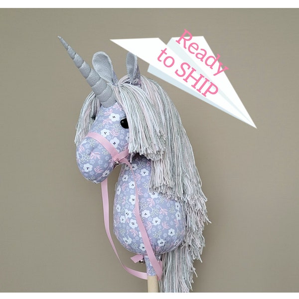 Unicorn on a stick for children and toddler ride with ribbon bridle and comb for mane care