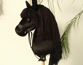 black stick horse