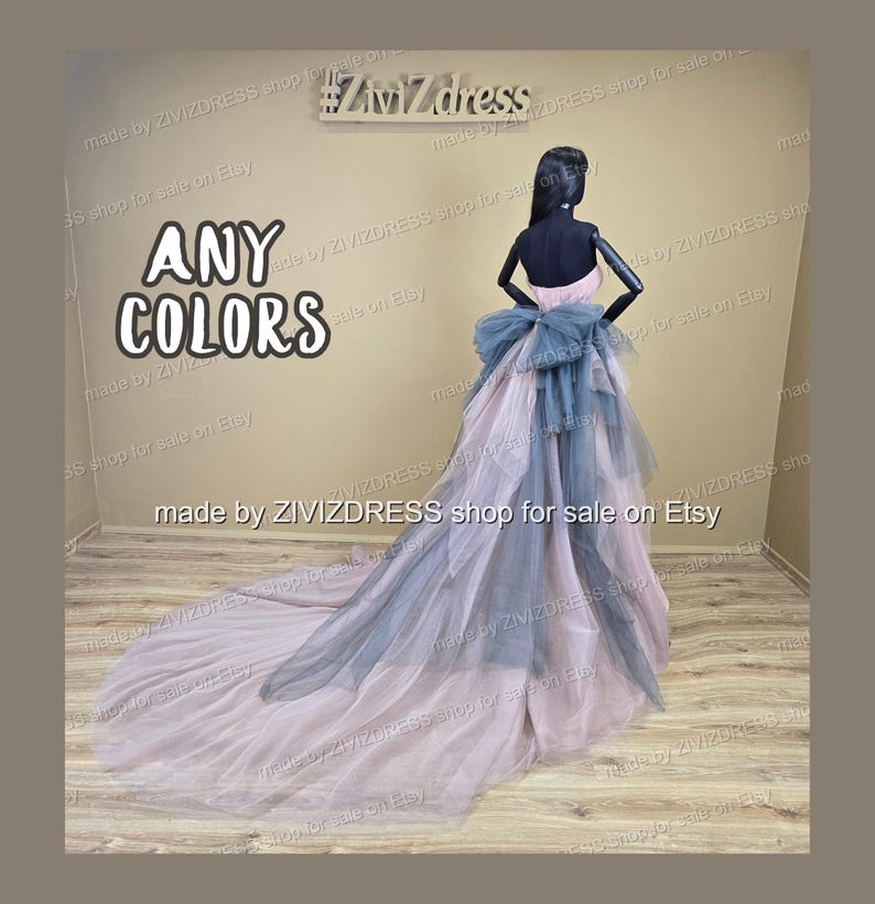 May include: A mannequin wearing a layered gown with a long train. The dress features a pink bodice, a blue bow, and layers of pink and blue tulle. The text "ANY COLORS" is displayed in large white letters.