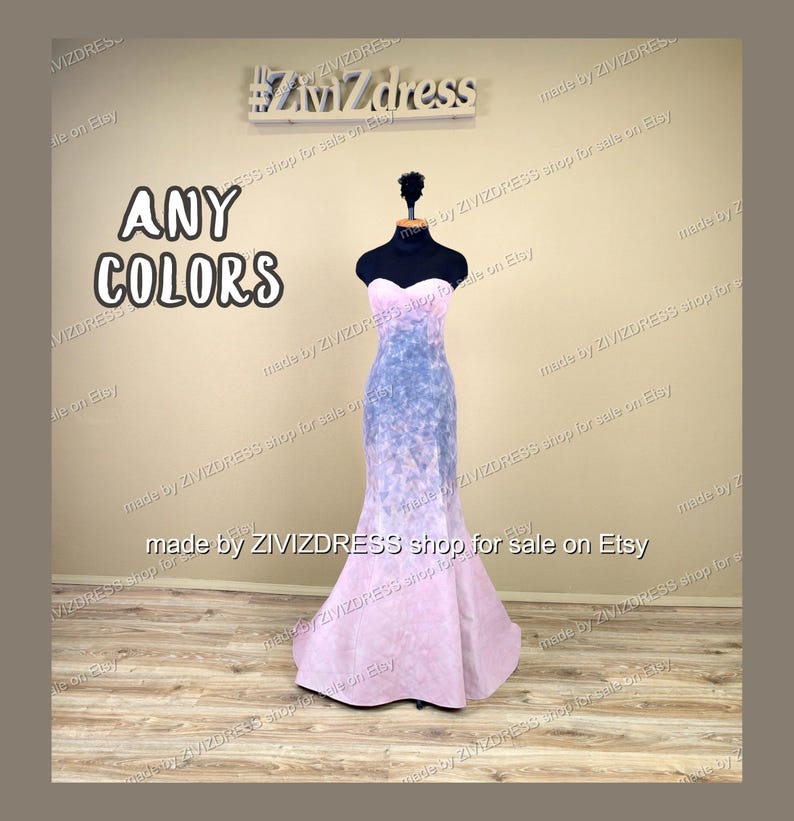 May include: A strapless, floor-length gown on a mannequin. The dress transitions from a light pink at the bottom to a blue-grey in the middle, with a sweetheart neckline. The words "ANY COLORS" are displayed in large, bold letters.