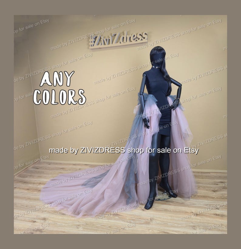 May include: A black mannequin wearing a black dress with a layered tulle skirt in shades of pink and grey. The text "ANY COLORS" is displayed. The shop name "ZIVIZDRESS" is also visible.