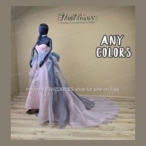 May include: A strapless formal gown in shades of pink and blue is displayed on a mannequin. The dress features a layered skirt and a long train. The text "ANY COLORS" is visible. The Etsy shop name "ZIVIZDRESS" is also visible.