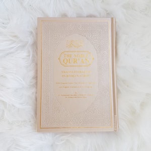 Quran with translation and transliteration in Roman script. Rainbow Quran
