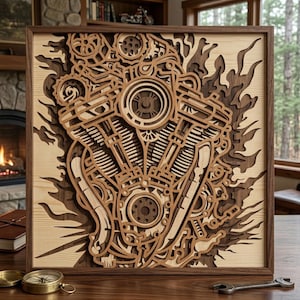 May include: A layered wooden artwork depicting a motorcycle engine. The artwork is framed in a dark brown wood and features intricate details of the engine's components. The color palette consists of light and dark browns, creating a three-dimensional effect. The artwork is displayed on a wooden table.