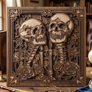 May include: A wooden wall art piece featuring two intricately carved skulls facing each other. The artwork includes roses, candles, and floral accents, all within a square frame. The piece is made of layered wood with a natural finish.
