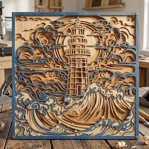 May include: A layered wooden art piece depicting a lighthouse scene. The artwork features a detailed lighthouse, waves, clouds, and a sun, all crafted from various shades of wood and accented with blue. The square frame is also blue.