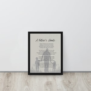 May include: A black and white framed print with a poem about a father's hands. The poem reads "A Father's Hands" and includes the text "Father's hands, worn and strong, Building a world where I belong. Each line a story, each scar a lesson, Crafting a life with every session."