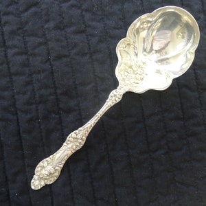 Alvin Old Orange Blossom Flowers in the Bowl Berry/Casserole Serving Spoon, Sterling Silver mono, 1905