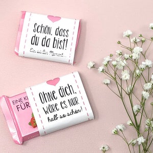 Banderuole al cioccolato "È bello che tu sia qui" - rosa con un cuore