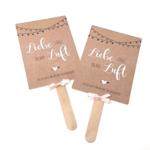 Fan wedding | Kraft paper look “Love is in the air”