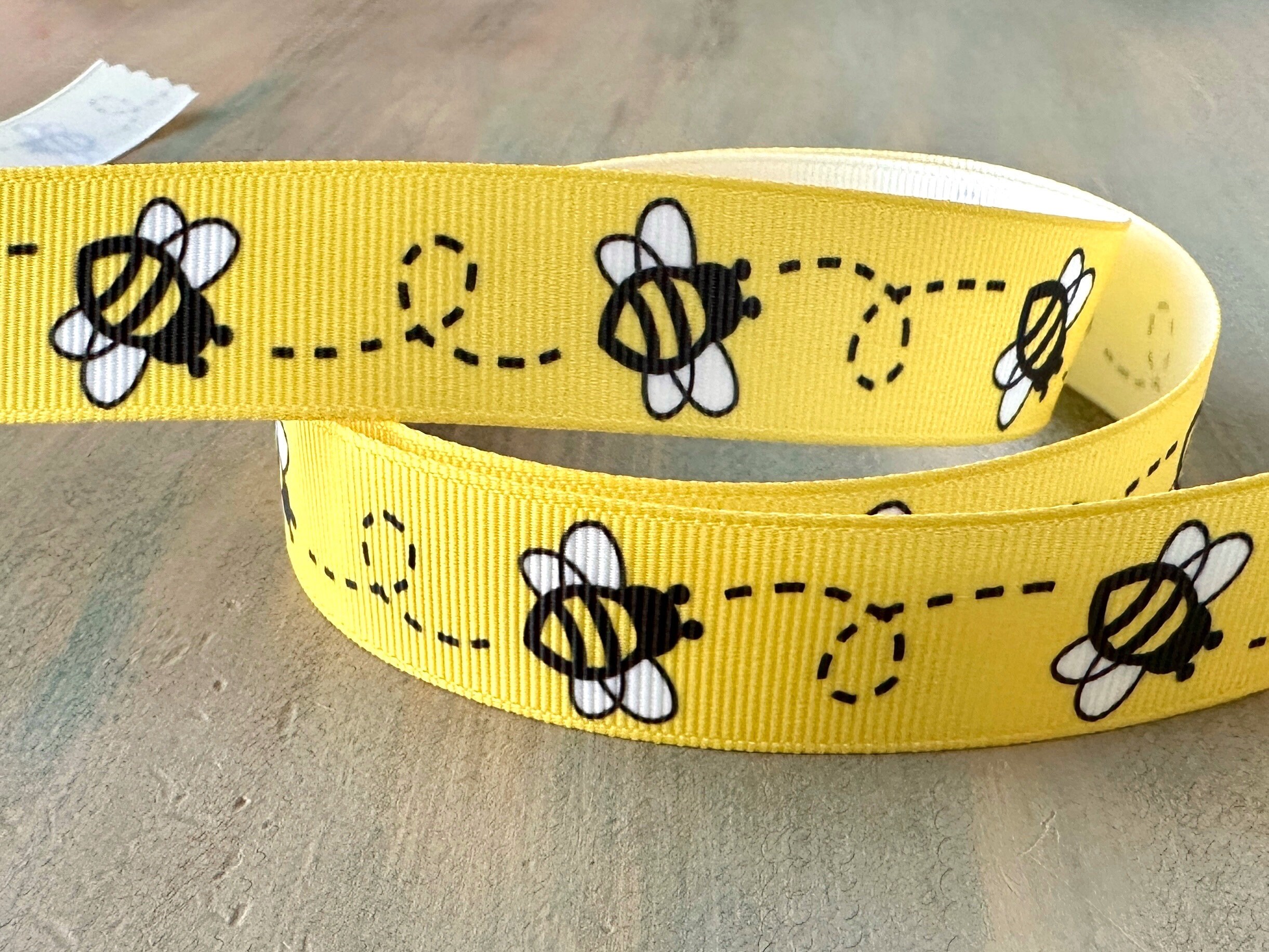 Buzzing Bees Ribbon with a yellow comb printed on 1.5 grosgrain