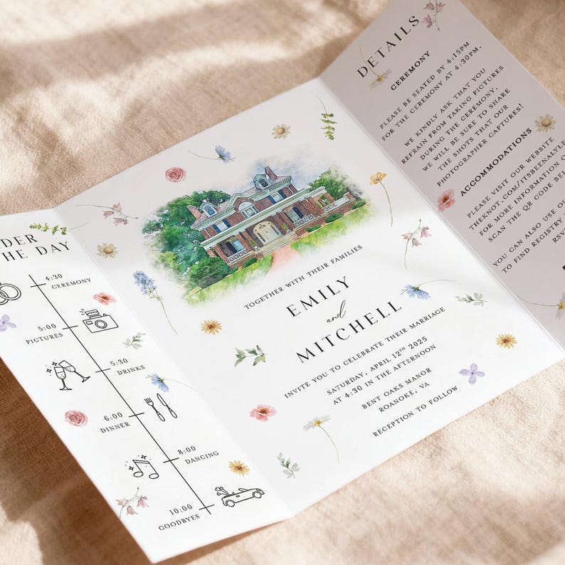 May include: A tri-fold wedding invitation with a watercolor illustration of a stately home. The invitation includes the names "Emily and Mitchell", the wedding date, and a timeline of events. Floral accents and delicate script enhance the design.