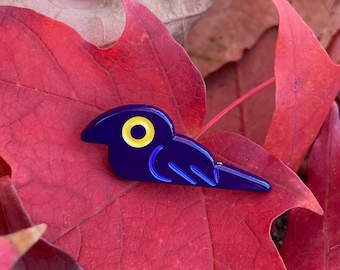 tiny resting crow pin