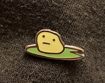 A frog?? very tiny pin