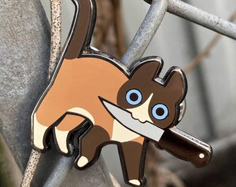 Snowshoe Knifecat Enamel Pin
