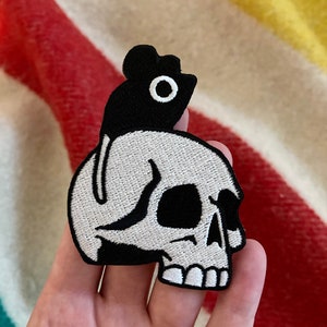 Mouse and skull embroidered patch