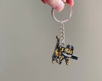 Tortoiseshell Knifecat metal keychain