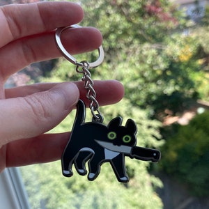 Tuxedo Knifecat metal keychain