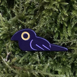 tiny resting crow pin