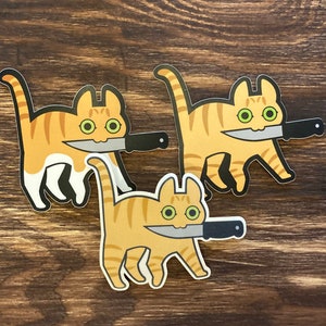 Knifecat Enamel Pin by MarlaDraw – DUAL WIELD STUDIO