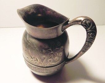 Lovely Floral Design on Pairpoint Silverplate Pitcher