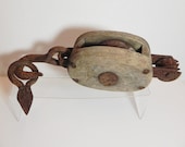 Old Barn Pulley With Wooden Wheel With Iron Holding Pin