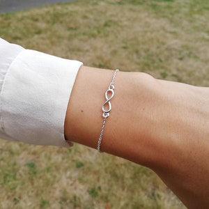 Bracelet Infinity plaqué or argent ou rose infini signe vie espoir femme bijou minimaliste cadeau tendance fantaisie moderne image 6