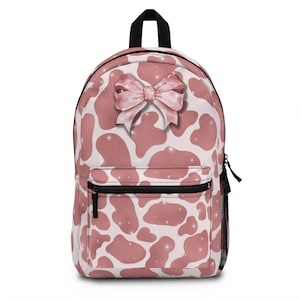 Pink Cow print Backpack with pink bow